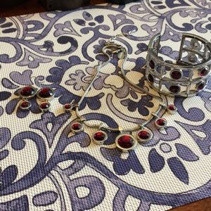 White House Black Market Jewelry 3 pc purple set.